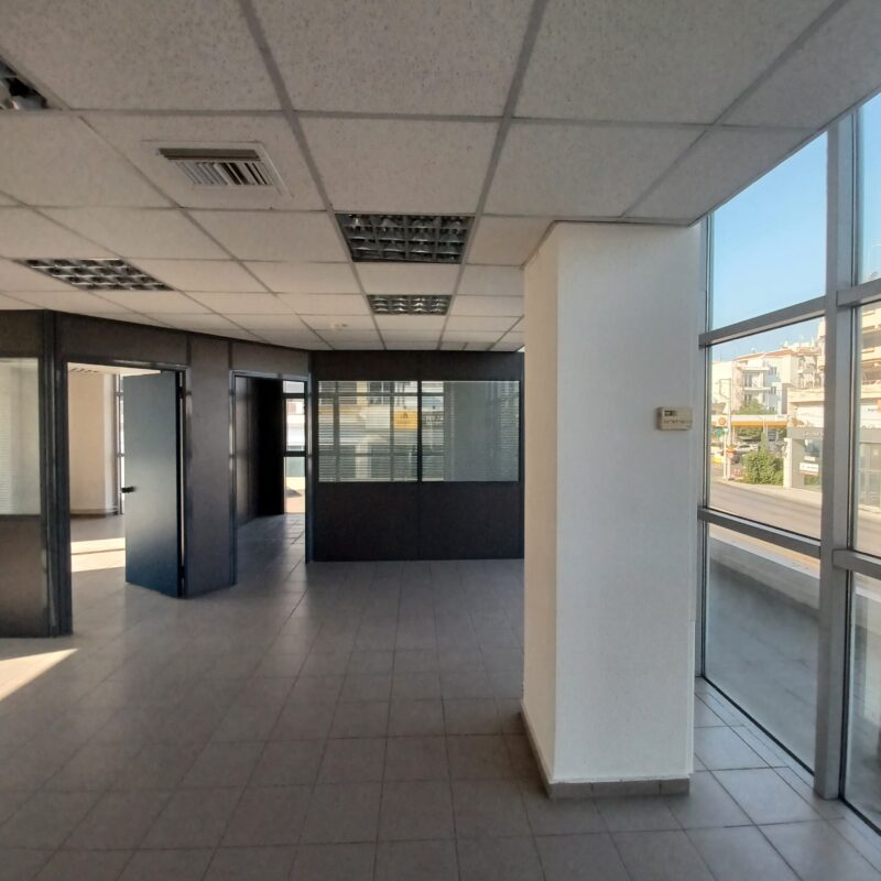 Office interior before renovation with outdated flooring, Athens Greece
