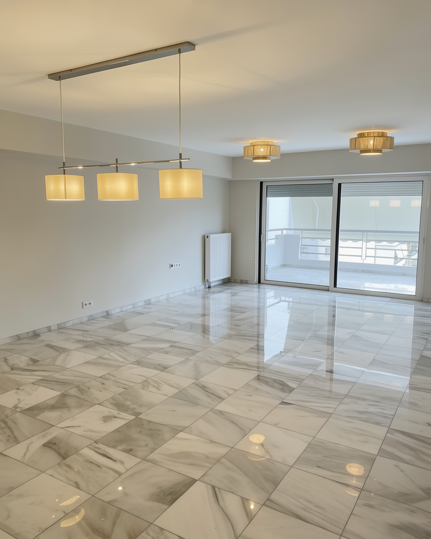 Open-plan living and dining area after renovation, Paleo Faliro Athens