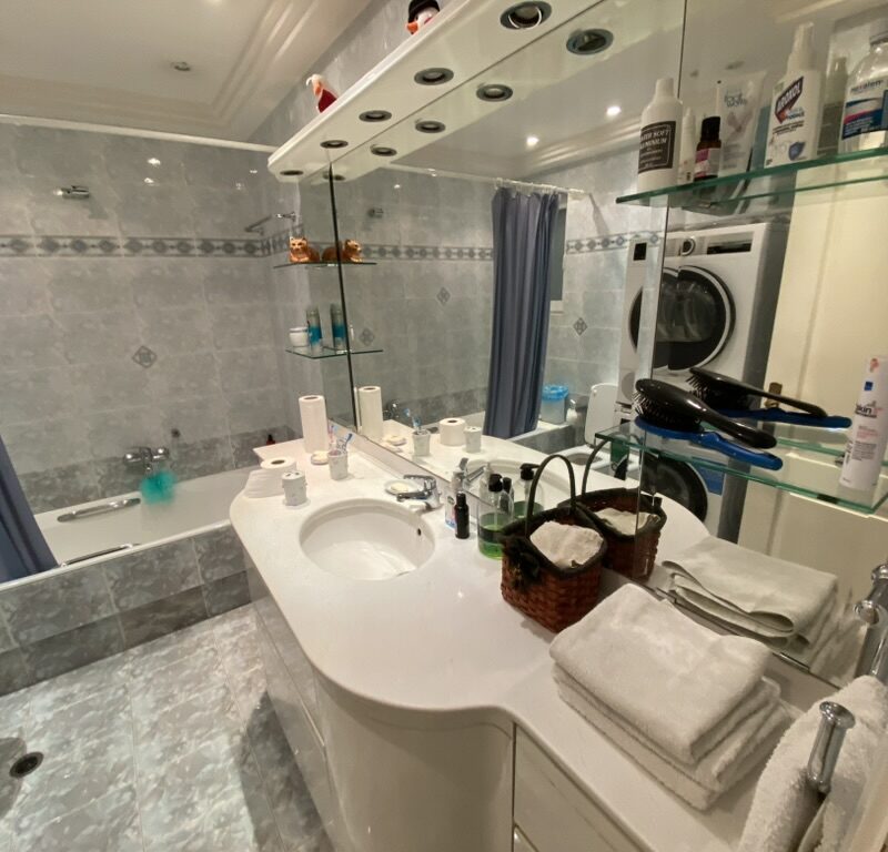 Bathroom before renovation with old tiles, Paleo Faliro Athens