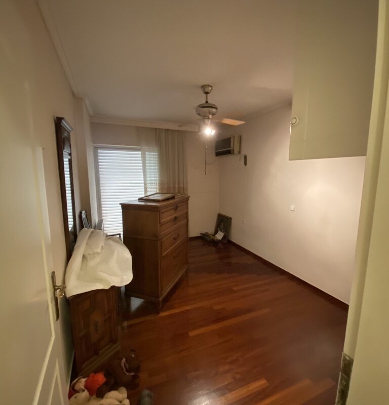 Bedroom before renovation with old flooring, Paleo Faliro